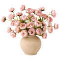 Arrangement floral de pivoines artificielles roses avec vase en céramique